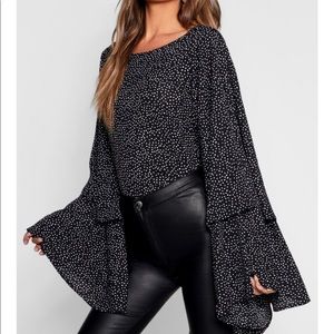 Black ruffle sleeve top